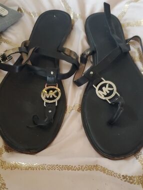 Michael Kors Black Leather Logo Thong Sandals with Gold & Silver Hardware